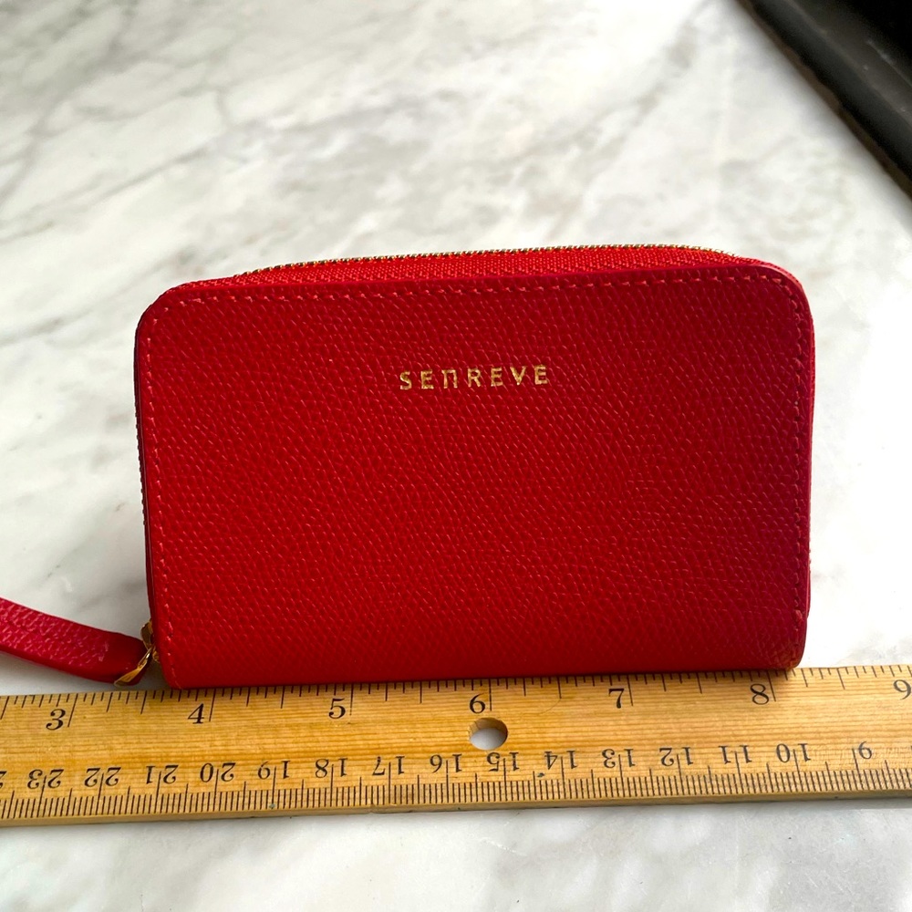 Beautiful bright red wallet with zipper closure